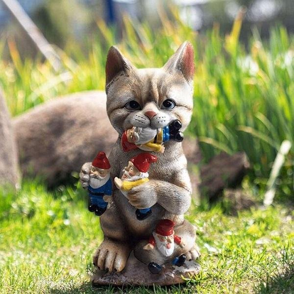 2669ea4ce20d7516877a2ecb7bbaa19c.jpg Cat Eating Gnomes Statue