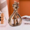 Romantic abstract passion hug kiss affectionate couple statue