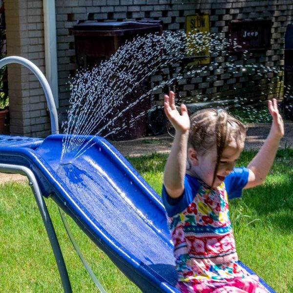 EFAE9693-54C0-2942-DAC0-BF2F3630A38F.jpg XDP Recreation 6 Foot Water Wave Slide with Built In Adjustable Sprinkler. Freestanding with Ground Pad and Hose Extension for Lawn Fun. Ages 3 to 8
