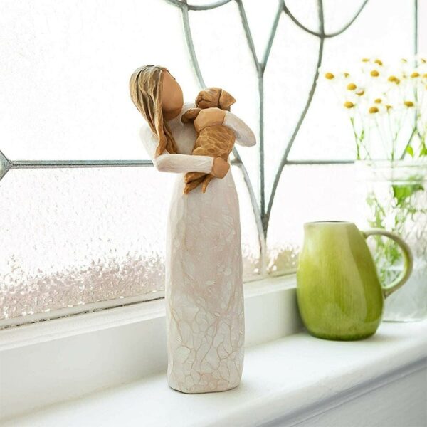 ddfcb40babe5822bb49d0efd9de68818.jpg Comfort Puppy Sculpture Angel of Friendship